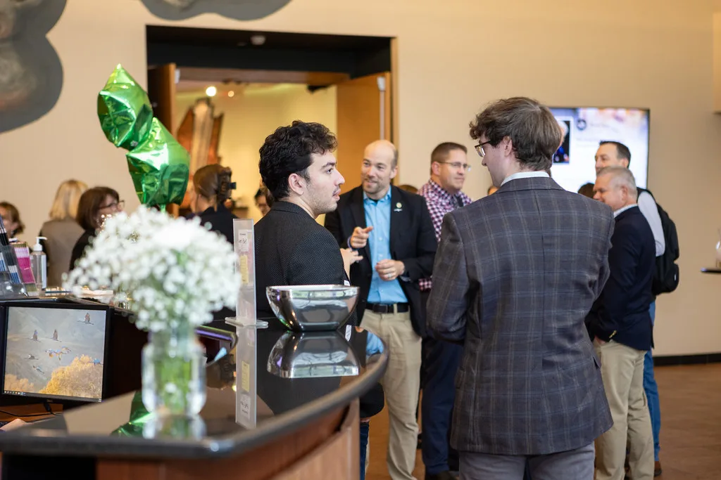 People networking at a professional event