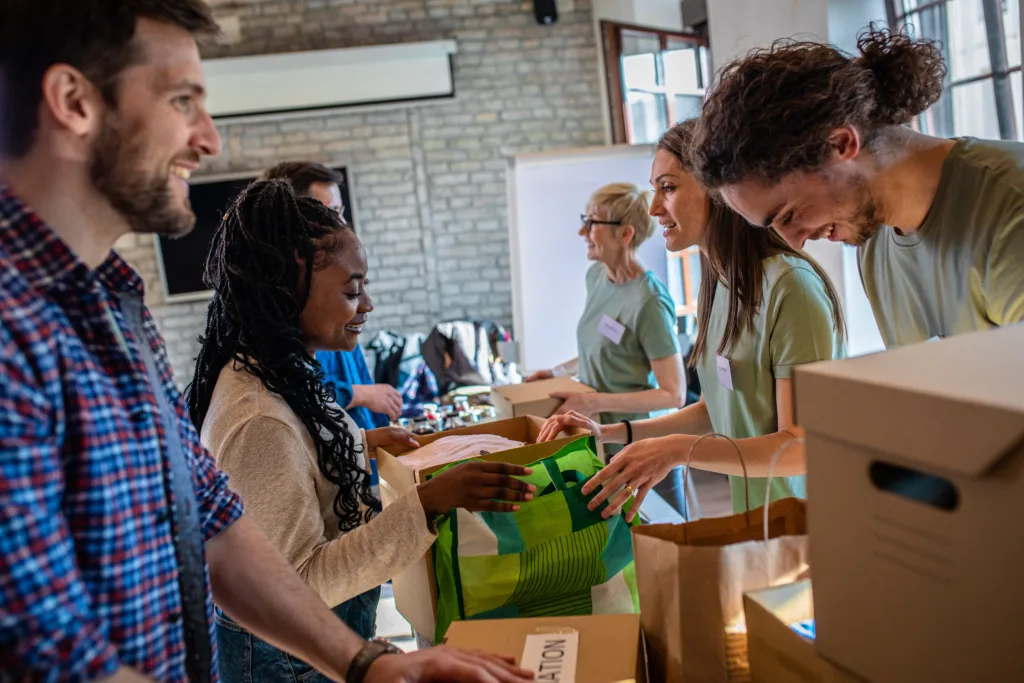 Group of volunteers working in a community center. 
